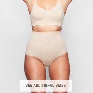 SKIMS SCULPTING MID WAIST BRIEF in clay